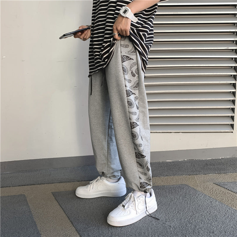 Koreanische Version des Trends der Retro Cashew Flower Casual Pants Stitching Loose Drawstring Pants