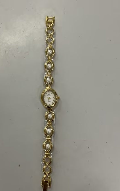 Neue Mid-antike Licht Luxus Imitation Perle Uhr Tempera Armband Damenuhr