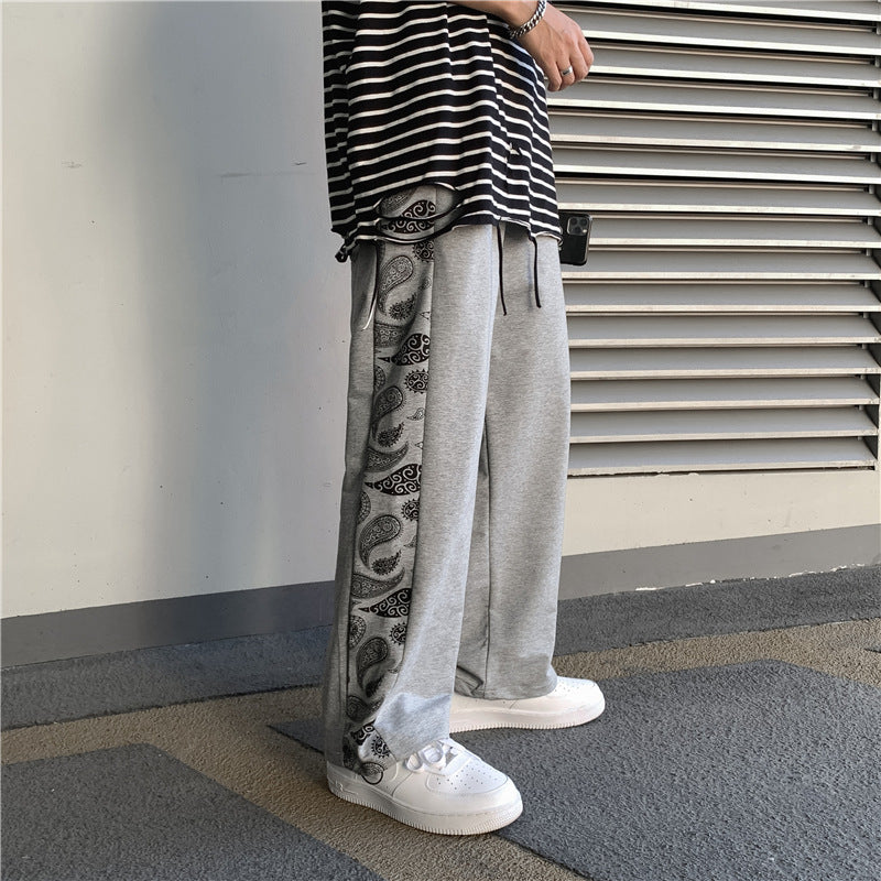 Koreanische Version des Trends der Retro Cashew Flower Casual Pants Stitching Loose Drawstring Pants