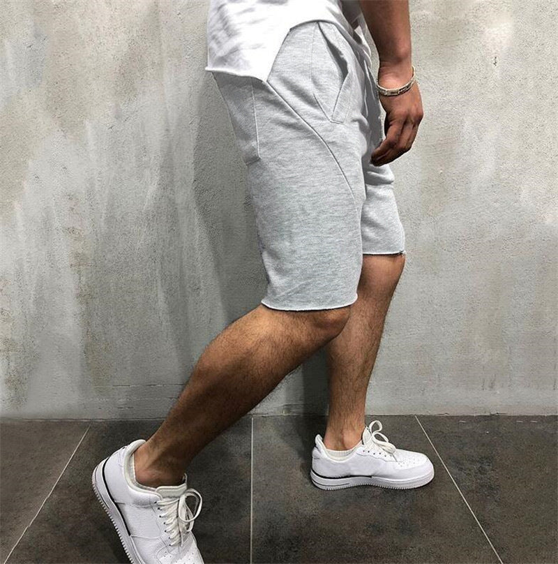 Europäische und amerikanische Fitness-Shorts für Herren in Volltonfarbe