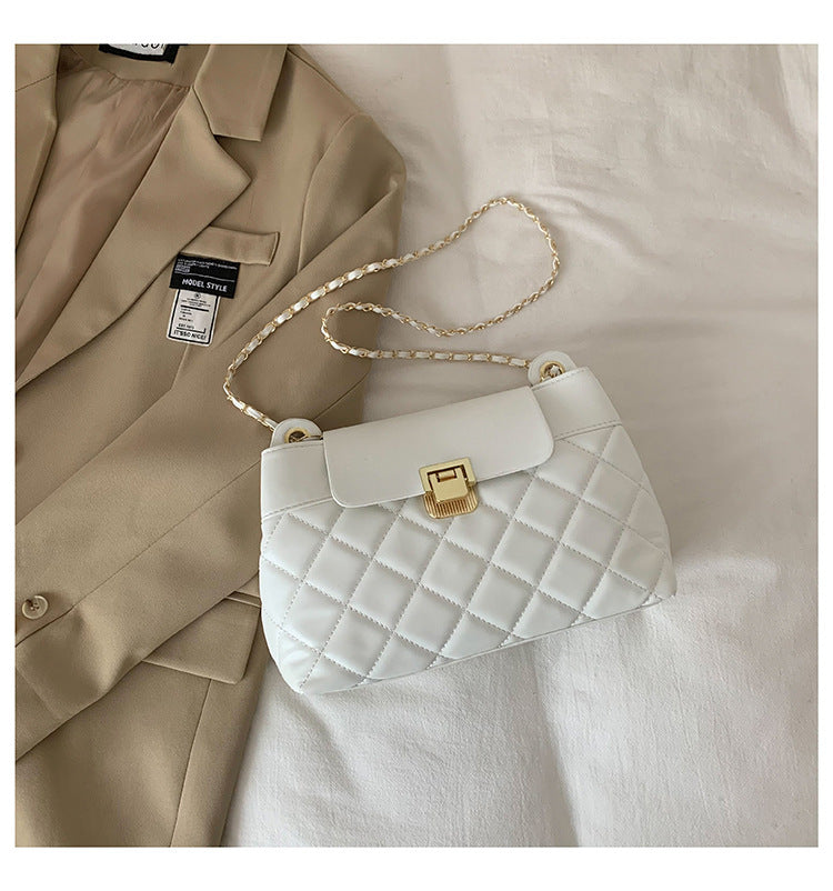 Umhängetasche mit Diamantkette und Pendlermotiv