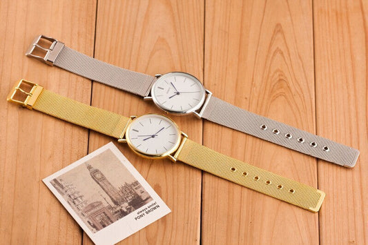 Geneva Edelstahl Mesh-Armbanduhr Ultradünne Geneva Herren- und Damen-Business-Uhren