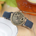 Mode Retro Hohl Musik Symbol Damen Uhr
