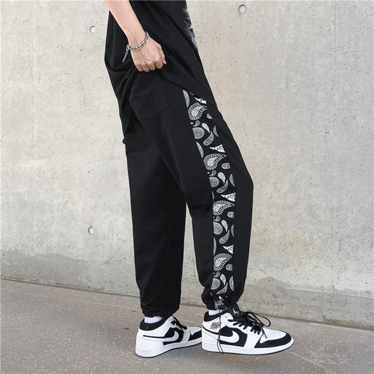 Koreanische Version des Trends der Retro Cashew Flower Casual Pants Stitching Loose Drawstring Pants