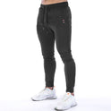 Einfarbige Sporthose mit Reißverschlusstasche