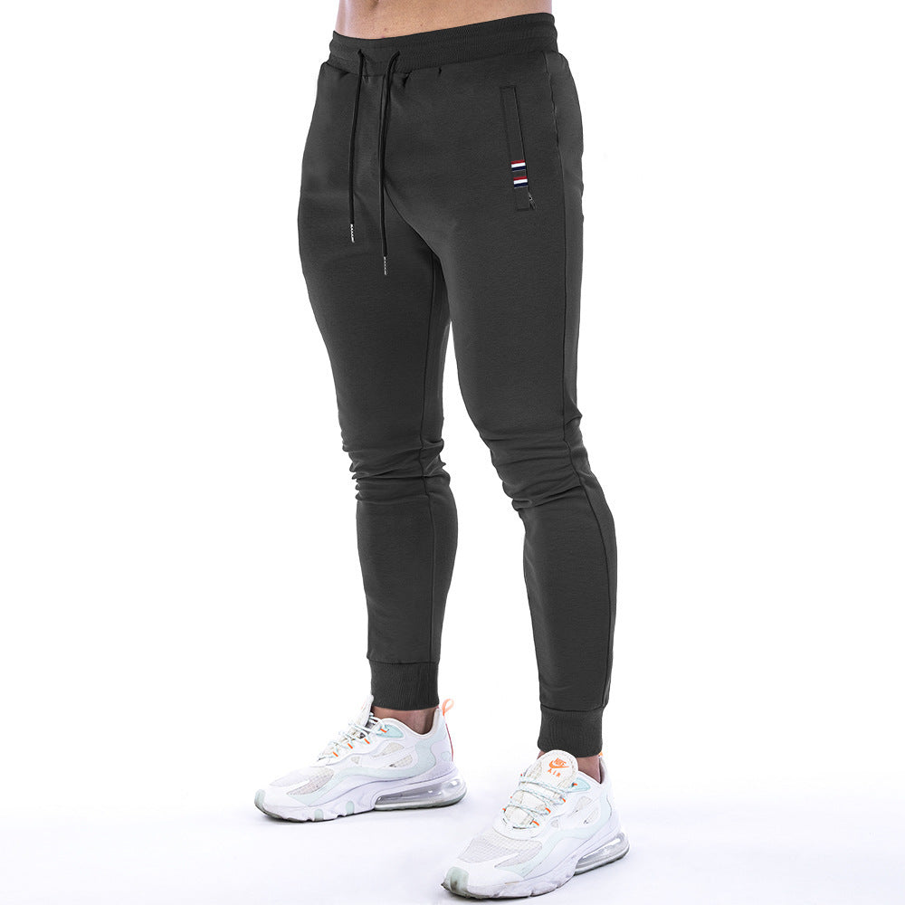 Einfarbige Sporthose mit Reißverschlusstasche