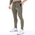 Einfarbige Sporthose mit Reißverschlusstasche