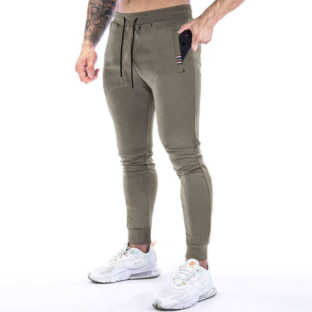 Einfarbige Sporthose mit Reißverschlusstasche