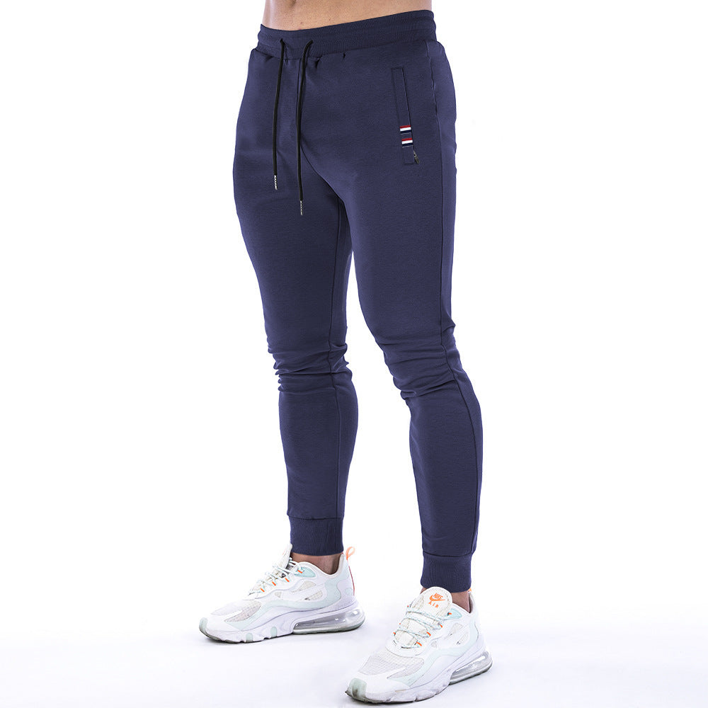 Einfarbige Sporthose mit Reißverschlusstasche