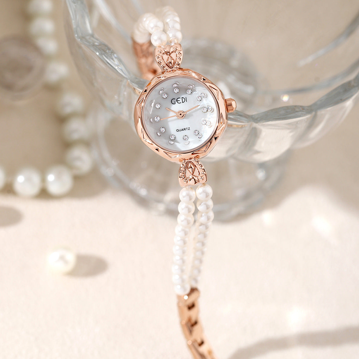 Nischen-Kreative und leicht luxuriöse Armbanduhr mit Perlenarmband für Damen