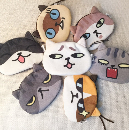 Die Katze kommt. Die Kometenmann-Handtasche. Die Katzen-Aufbewahrungstasche.