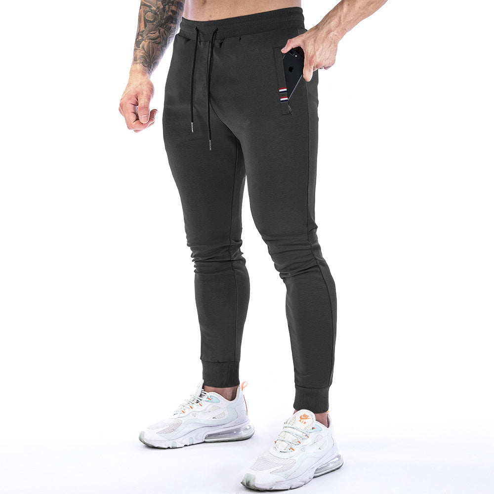 Einfarbige Sporthose mit Reißverschlusstasche