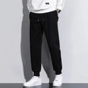 Gerade schwarze, lockere, lässige Strick-Sporthose