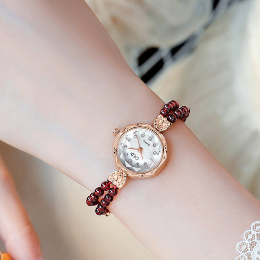 Nischen-Kreative und leicht luxuriöse Armbanduhr mit Perlenarmband für Damen