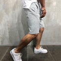 Europäische und amerikanische Fitness-Shorts für Herren in Volltonfarbe