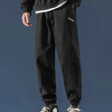 Overall mit Kordelzug Locker sitzende Sporthose mit kleinen Füßen für Jungen