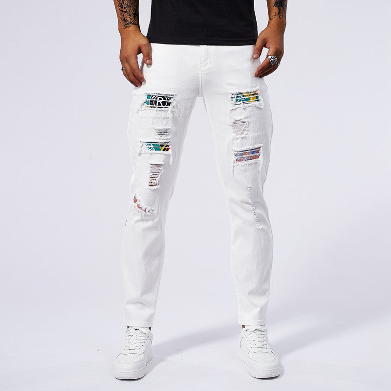 Jeans mit Lochpatch und verwaschenem Look