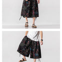 Locker sitzende Herrenhose im chinesischen Stil mit Elefantenblume, verkürzte große Badehose, Rettich-Strandblumenhose