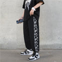Koreanische Version des Trends der Retro Cashew Flower Casual Pants Stitching Loose Drawstring Pants