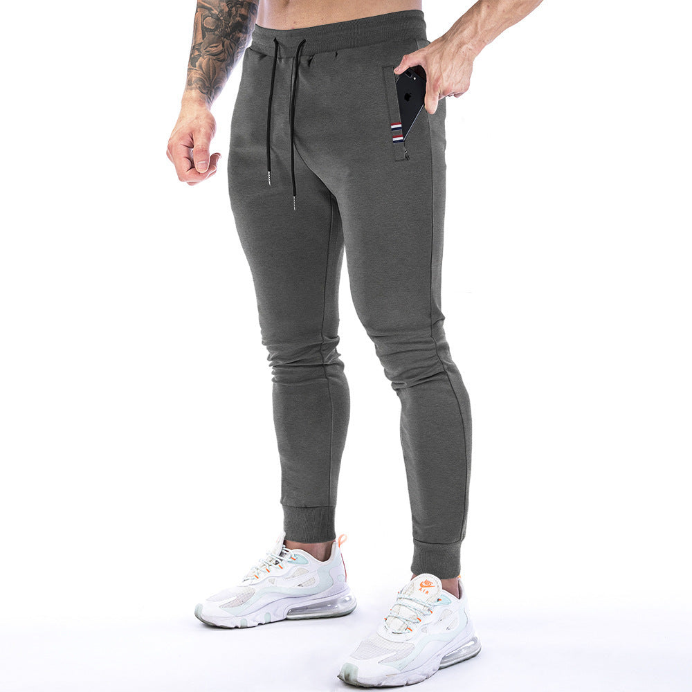 Einfarbige Sporthose mit Reißverschlusstasche