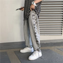 Koreanische Version des Trends der Retro Cashew Flower Casual Pants Stitching Loose Drawstring Pants