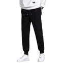 Gerade schwarze, lockere, lässige Strick-Sporthose