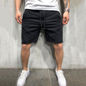 Europäische und amerikanische Fitness-Shorts für Herren in Volltonfarbe