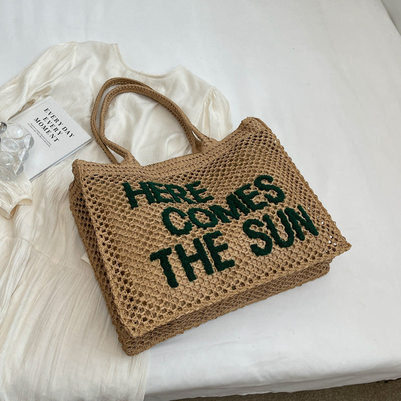 Schultertasche mit gewebtem Hohlmuster